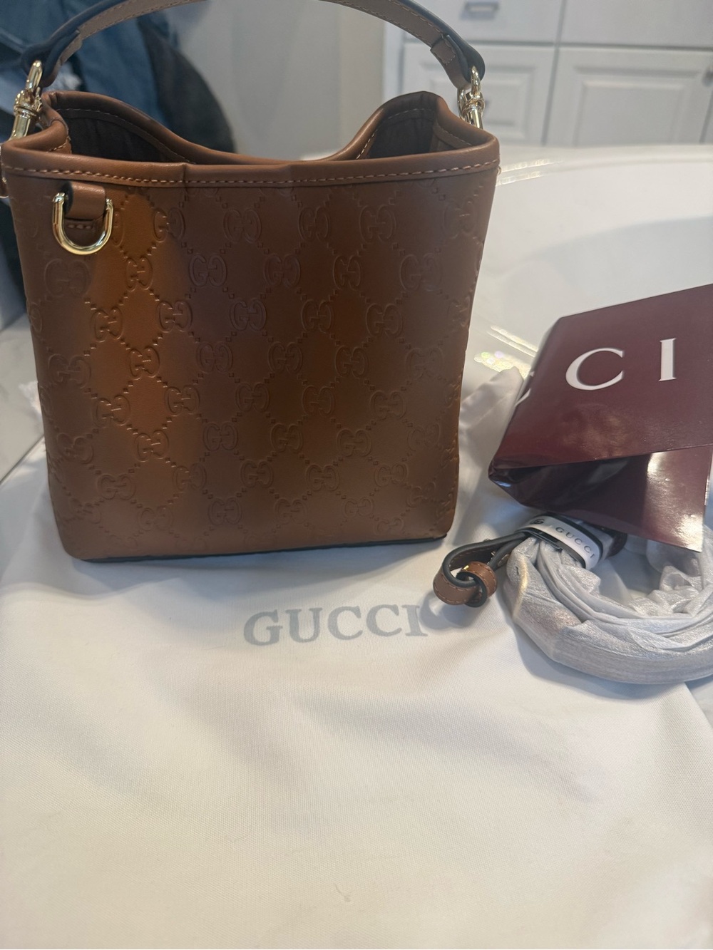 Gucci Mini Shoulder Bag in Brown Embossed Leather